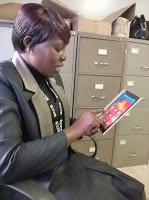 Ms. Rose Achiego AMECEA Online News Correspondent from Kenya conference of Catholic Bishops. She is one of the beneficiaries of the tablets